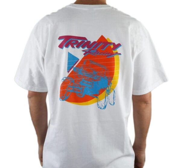 A white t-shirt with a picture of a surfboard.