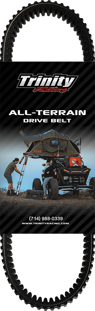 A man working on the back of an atv.