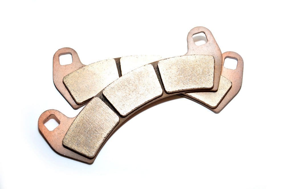 A pair of brake pads that are on top of each other.