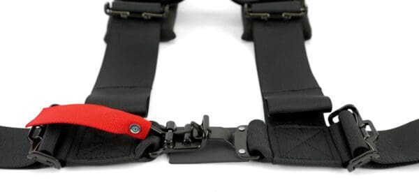 A close up of the strap on a racing harness