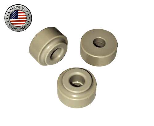 A group of three small round plastic spacers.