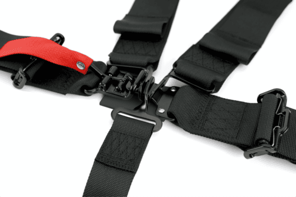 A close up of the seat belt on a car