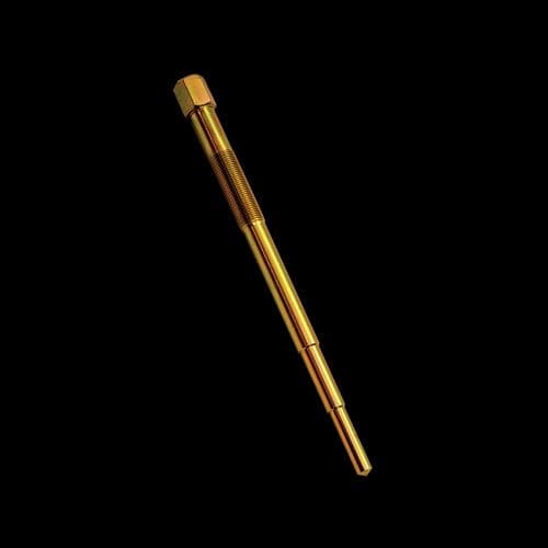 A gold colored pen is shown on the black background.