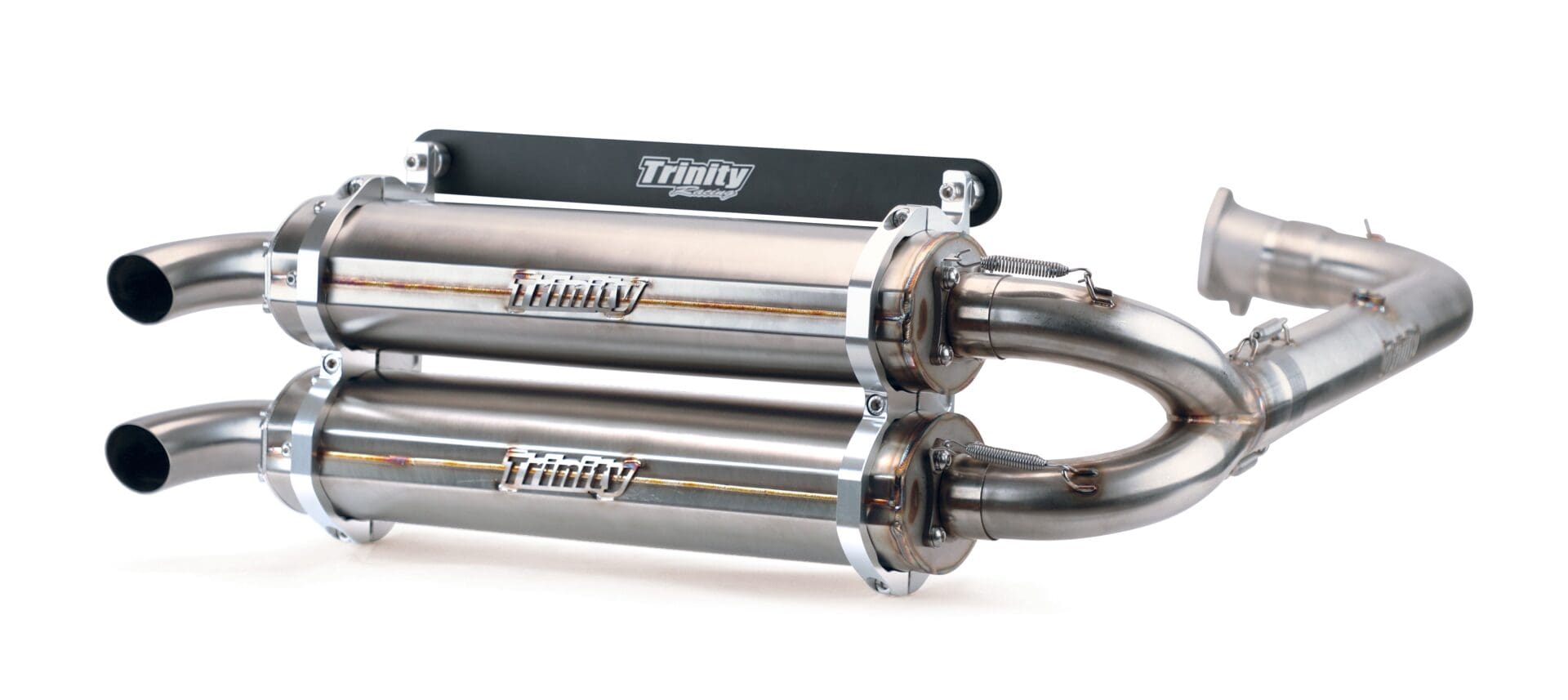 A pair of chrome exhaust pipes with the name trinity on them.